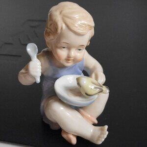 Little Baby Girl Sit Eat w/ Spoon & Bird on Bowl CUTE Porcelain Figurine 4" Tall